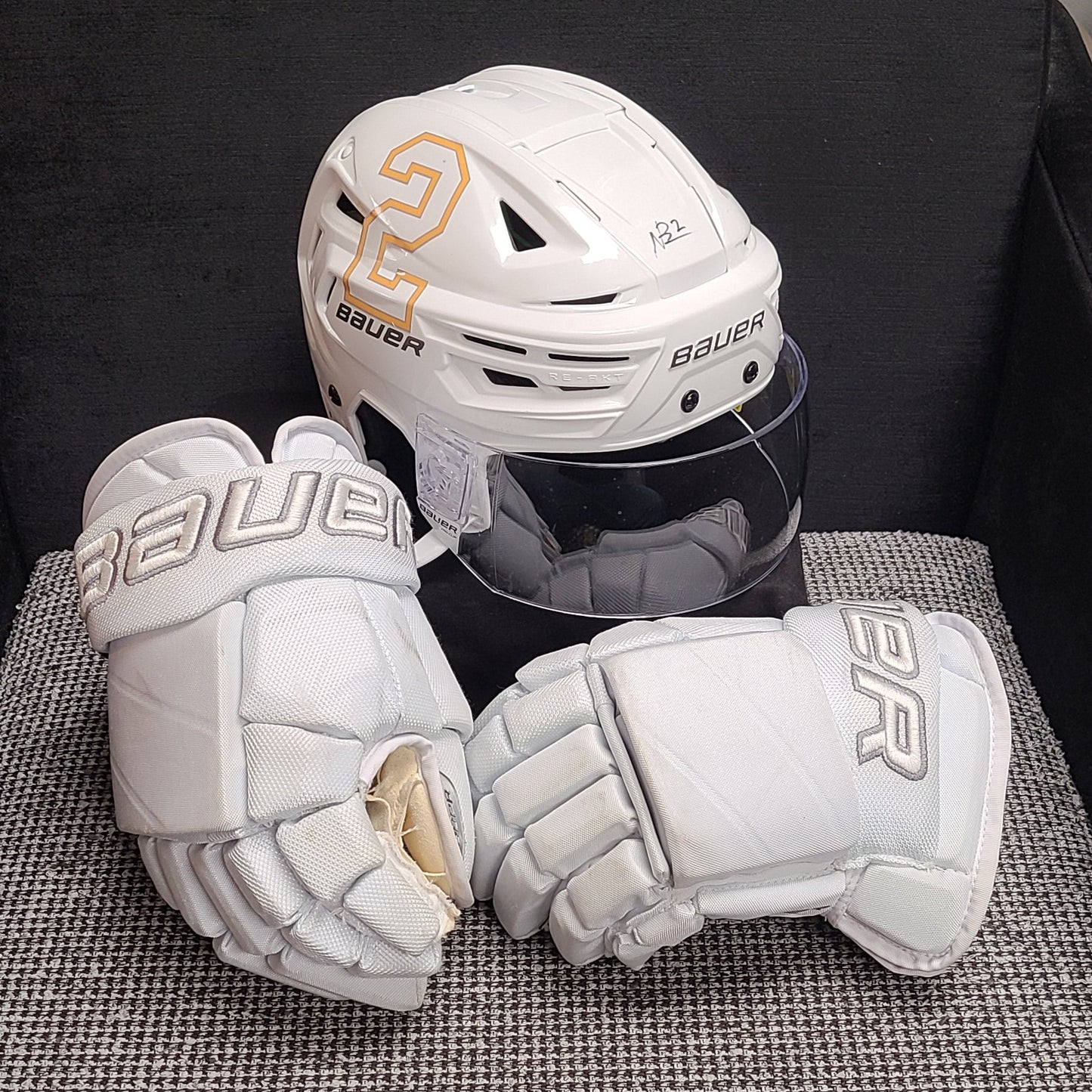 25-26 Autographed White Out Helmets and Glove Set